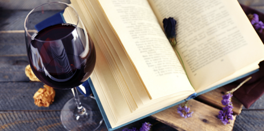 Wine and book with a flover